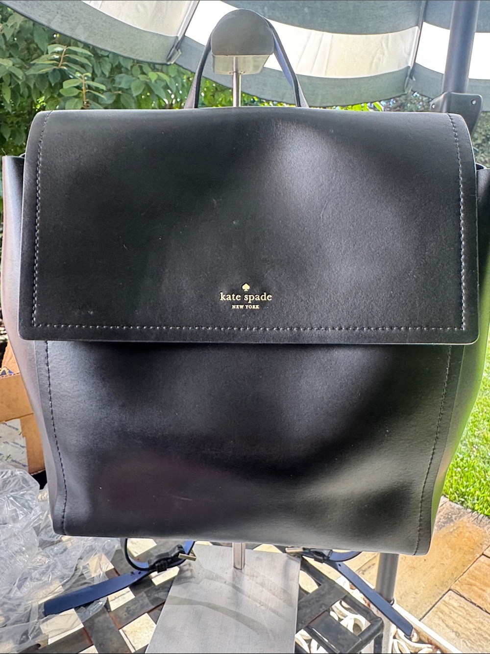 Kate spade black Leather backpack with Blue leather lining and Gold Hardware